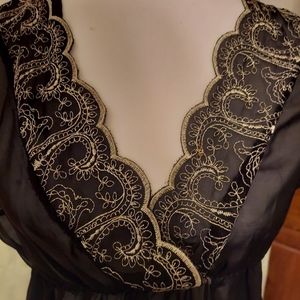 Black sheer blouse. Size Small